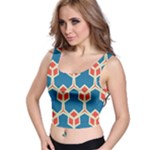 Orange shapes on a blue background Crop Top