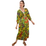 Colorful brush strokes painting on a green background                                                      Grecian Style Maxi Dress