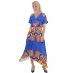 Yellow red shapes on a blue background                                                           Cross Front Sharkbite Hem Maxi Dress