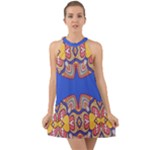 Yellow red shapes on a blue background                                                             Halter Tie Back Chiffon Dress