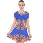 Yellow red shapes on a blue background                                                       Caught in a Web Dress