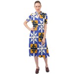 Shapes on a blue background                                                              Keyhole Neckline Chiffon Dress