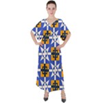 Shapes on a blue background                                                              V-Neck Boho Style Maxi Dress
