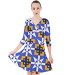 Shapes on a blue background                                                             Quarter Sleeve Front Wrap Dress