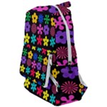 Colorful flowers on a black background pattern                                                      Travelers  Backpack