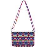 Pastel shapes rows on a purple background                                                               Double Gusset Crossbody Bag