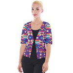 Pastel shapes rows on a purple background                                                                Cropped Button Cardigan