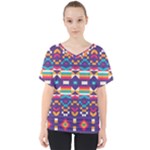 Pastel shapes rows on a purple background                                                                  V-Neck Dolman Drape Top