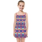 Pastel shapes rows on a purple background                                                                  Kids Summer Sun Dress