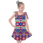 Pastel shapes rows on a purple background                                                               Kids  Tie Up Tunic Dress