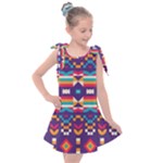 Pastel shapes rows on a purple background                                                               Kids  Tie Up Tunic Dress