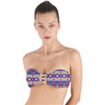 Pastel shapes rows on a purple background                                                              Twist Bandeau Bikini Top