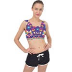 Pastel shapes rows on a purple background                                                                  V-Back Sports Bra