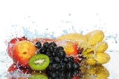 variety of fruit water berry food splash kiwi grape