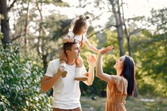 cute family playing autumn field