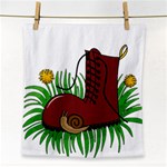 Boot in the grass Face Towel